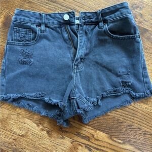 Black/slightly white washed shorts.